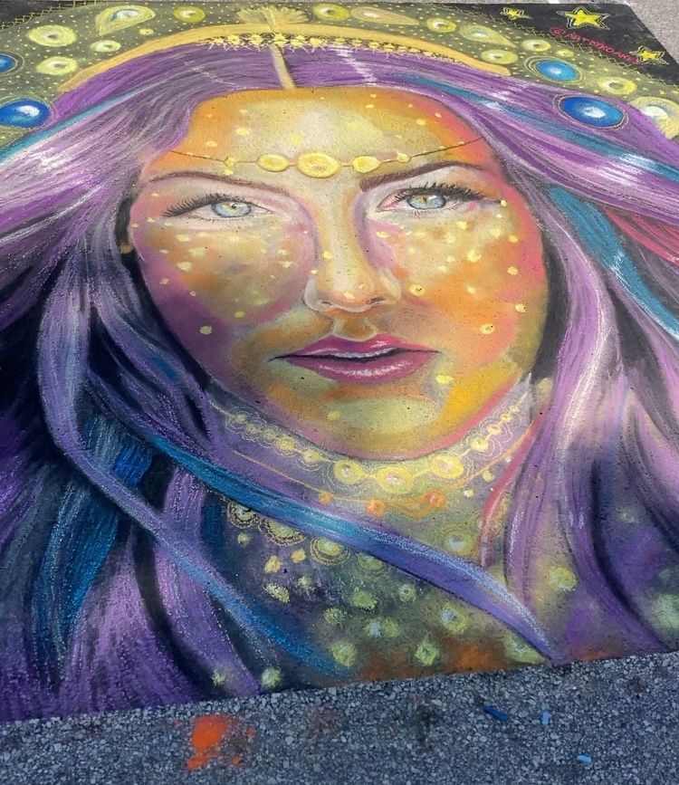 chalk art drawing of a woman with stars